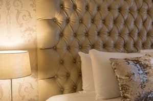 Guestroom Raheen Woods Hotel Cream Leather Headboard 